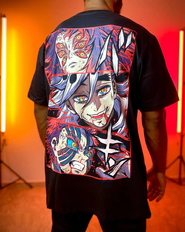 A couple wearing matching oversized Demon Slayer Graphic T Shirts in a hip hop, Y2K streetwear style.