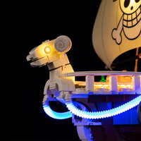 A Going Merry LED Light Set illuminating the 75639 pirate ship building block model, showcasing glowing cabins and deck lights.
