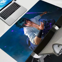 A premium Sasuke Uchiha Mouse Pad featuring an HD print anime graphic, designed as a non-slip rubber gaming desk mat for computer accessories.