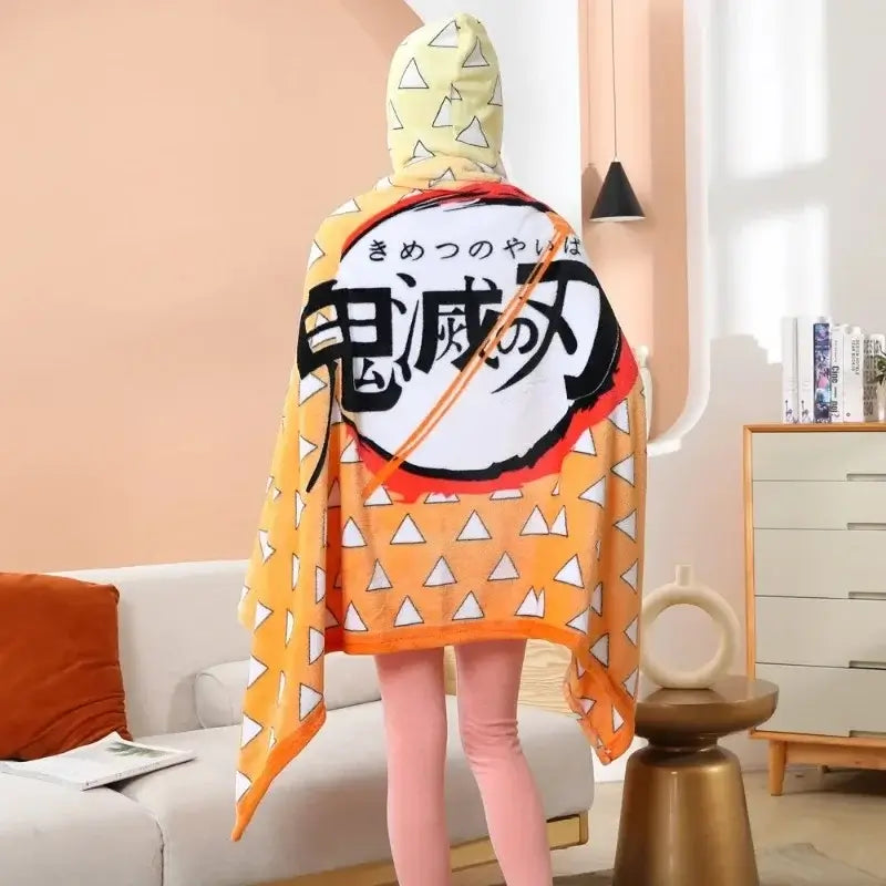 A cozy Demon Slayer Blanket styled as a Tanjiro Kamado plaid haori, functioning as a wearable bathrobe and anime cosplay shawl.