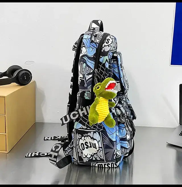 A high-capacity One Piece Luffy Backpack featuring a vibrant graffiti print of Monkey D. Luffy, designed as a durable school bag for middle and high students.