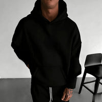 A trendy oversized Demon Slayer Hooded Sweatshirt featuring colorful anime character graphics, designed as casual autumn streetwear for men and women.