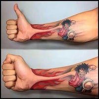 One Piece Temporary Tattoo Stickers illustration showing Luffy with fire fist design on a forearm.