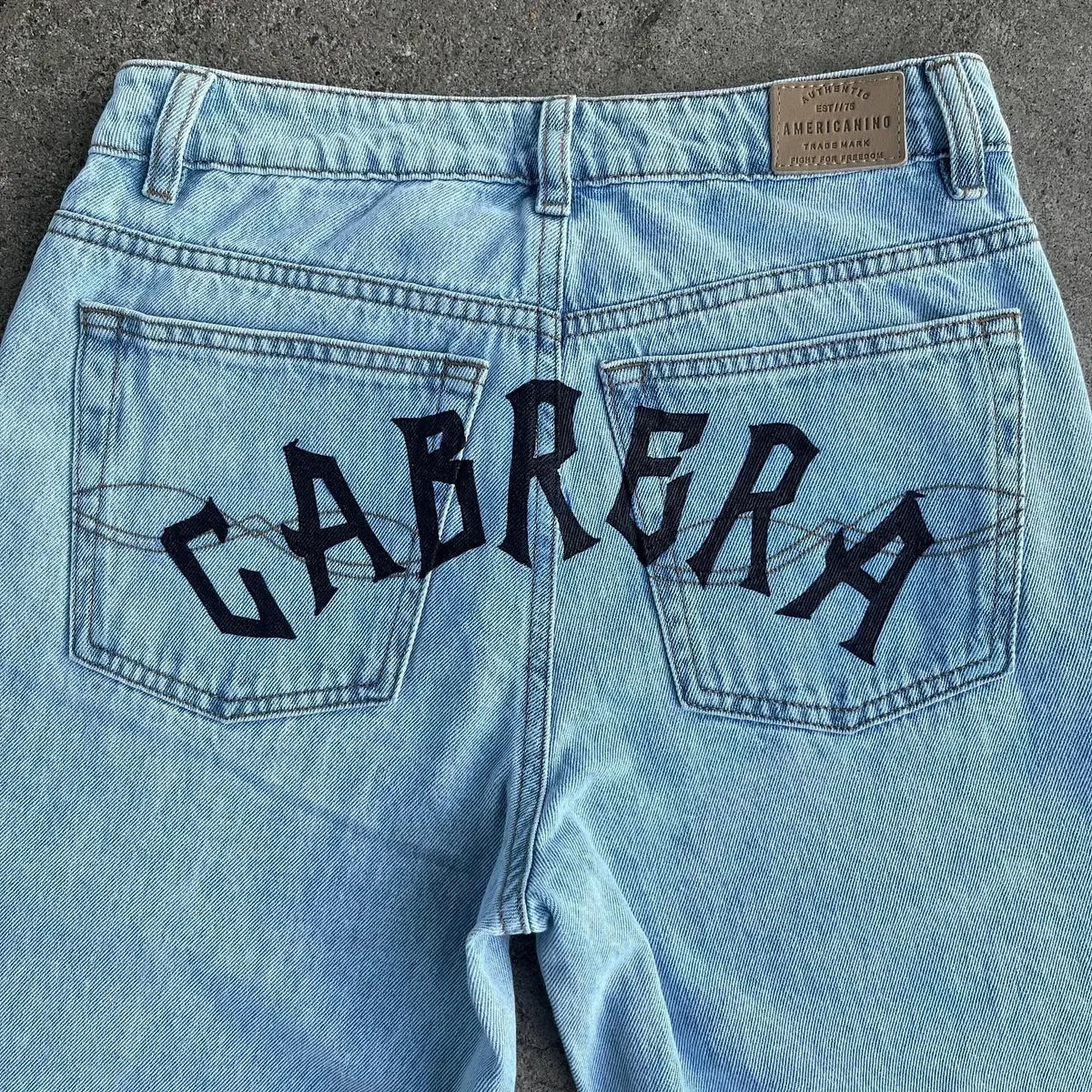 Trendy Y2K Anime Baggy Jeans featuring a Harajuku graphic print pattern, designed as high-waisted vintage streetwear for men and women.
