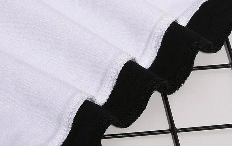 A loose-fit Nezuko Kamado T-shirt featuring a cute Demon Slayer graphic, designed as a parent-child matching outfit for summer.