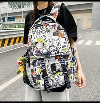 A high-capacity One Piece Luffy Backpack featuring a vibrant graffiti print of Monkey D. Luffy, designed as a durable school bag for middle and high students.