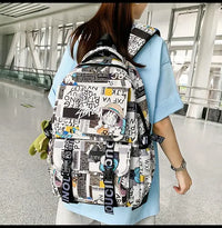 A high-capacity One Piece Luffy Backpack featuring a vibrant graffiti print of Monkey D. Luffy, designed as a durable school bag for middle and high students.