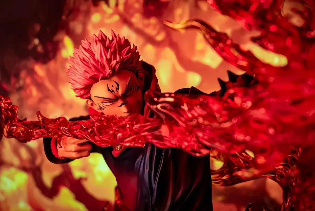 A highly detailed Ryomen Sukuna Figure made of premium PVC, showcasing the Jujutsu Kaisen King of Curses in an extreme battle stance for desktop decoration.