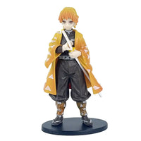 A highly detailed 16cm Demon Slayer Anime Figure made of premium PVC, showcasing Kamado Tanjiro in a dynamic warrior action pose for desktop decoration.