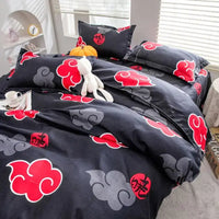 A creative Naruto Akatsuki Bedding four-piece set featuring cute 2D cartoon anime characters on a duvet cover and bed sheets.