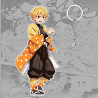 A 6cm Demon Slayer Keychain made of acrylic featuring a cute Tanjiro Kamado anime character, used as a bag pendant or key ring.