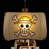 A Going Merry LED Light Set illuminating the 75639 pirate ship building block model, showcasing glowing cabins and deck lights.
