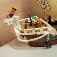 A detailed One Piece Going Merry Building Blocks set featuring the Straw Hat Pirate Ship, designed as an assembly model toy for children and collectors.