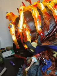 A dynamic Luffy Gear 3 Figure made of PVC, featuring glowing LED Red Roc fire effects, designed as a GK anime collectible statue.