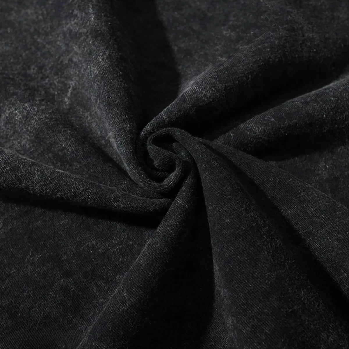Close-up of the soft fabric texture of the Obito Uchiha Mask Acid Wash T-Shirt in black.