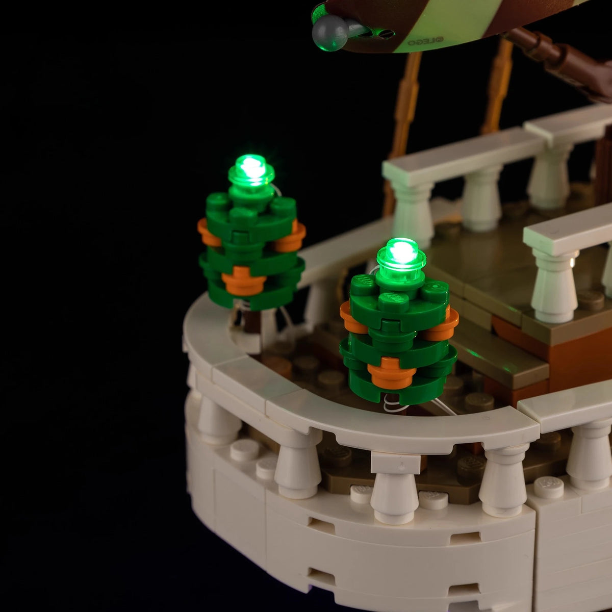 A Going Merry LED Light Set illuminating the 75639 pirate ship building block model, showcasing glowing cabins and deck lights.