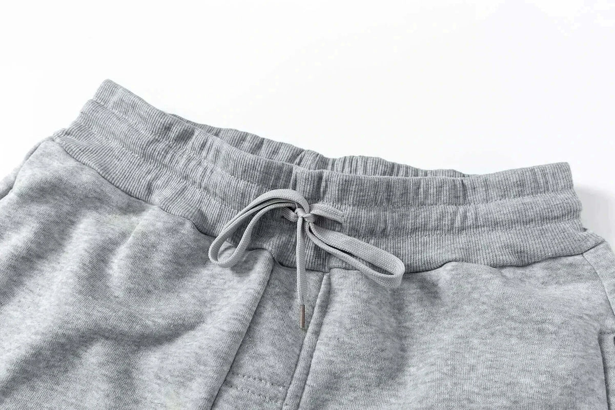 Trendy Luffy Gear 5 Pants featuring a graphic print of Sun God Nika, designed as casual hip-hop sweatpants for men's gym and streetwear fashion.
