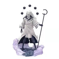 A highly detailed 28cm Uchiha Madara Figure made of premium PVC, showcasing the legendary Naruto anime character in a dynamic battle stance.