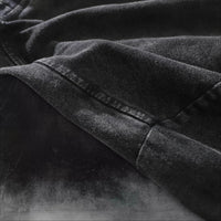 Close-up of the soft fabric texture of the Obito Uchiha Mask Acid Wash T-Shirt in black.