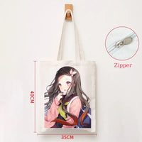 A durable Demon Slayer Canvas Bag featuring Kamado Nezuko and Tanjiro anime graphics, designed as a zipper tote for students and shoppers.