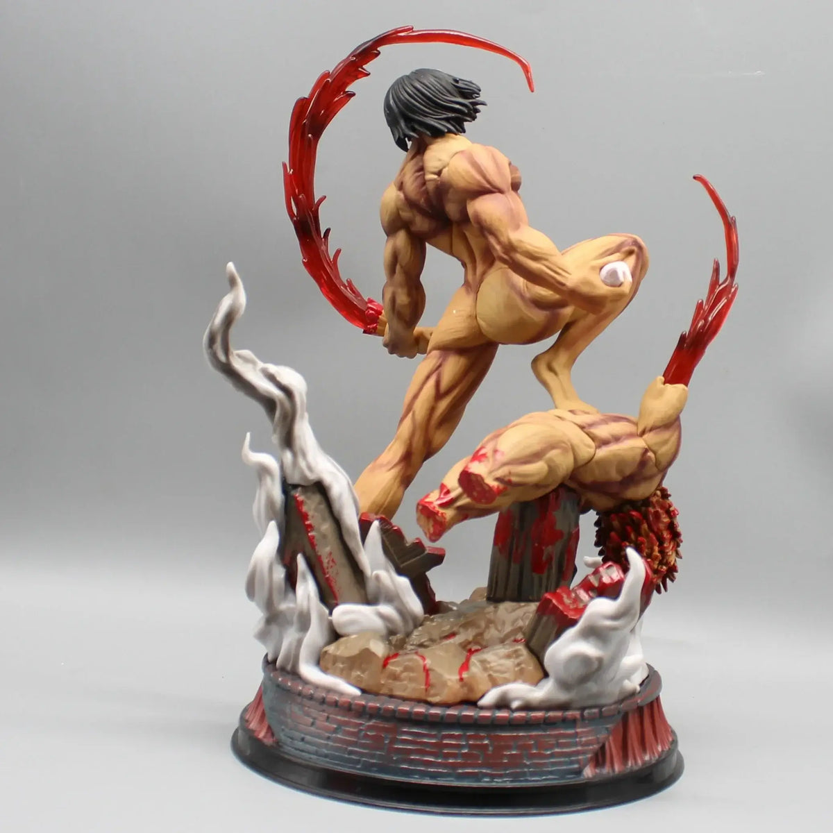 A highly detailed 29cm Eren Jaeger Figure made of premium PVC, showcasing the Attack on Titan protagonist in a dynamic pose for anime desktop decoration.