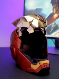A wearable AutoKing Iron Man Helmet (Mk5) featuring voice-controlled opening face plates and glowing LED eyes for adult cosplay and display.