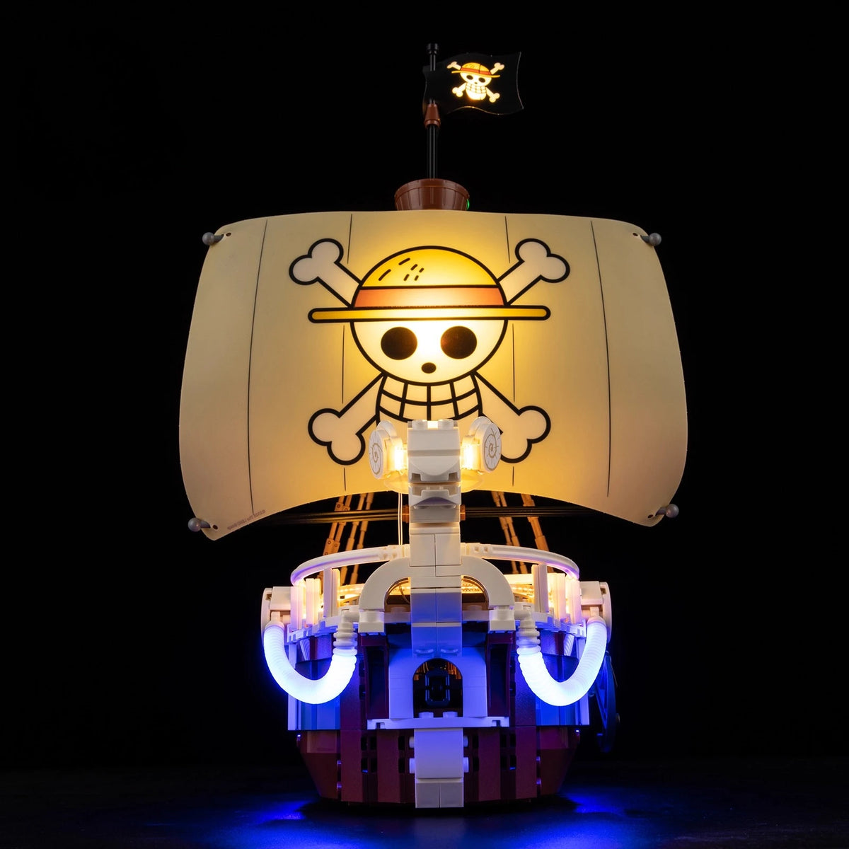 A Going Merry LED Light Set illuminating the 75639 pirate ship building block model, showcasing glowing cabins and deck lights.