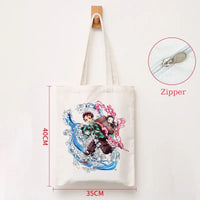 A durable Demon Slayer Canvas Bag featuring Kamado Nezuko and Tanjiro anime graphics, designed as a zipper tote for students and shoppers.