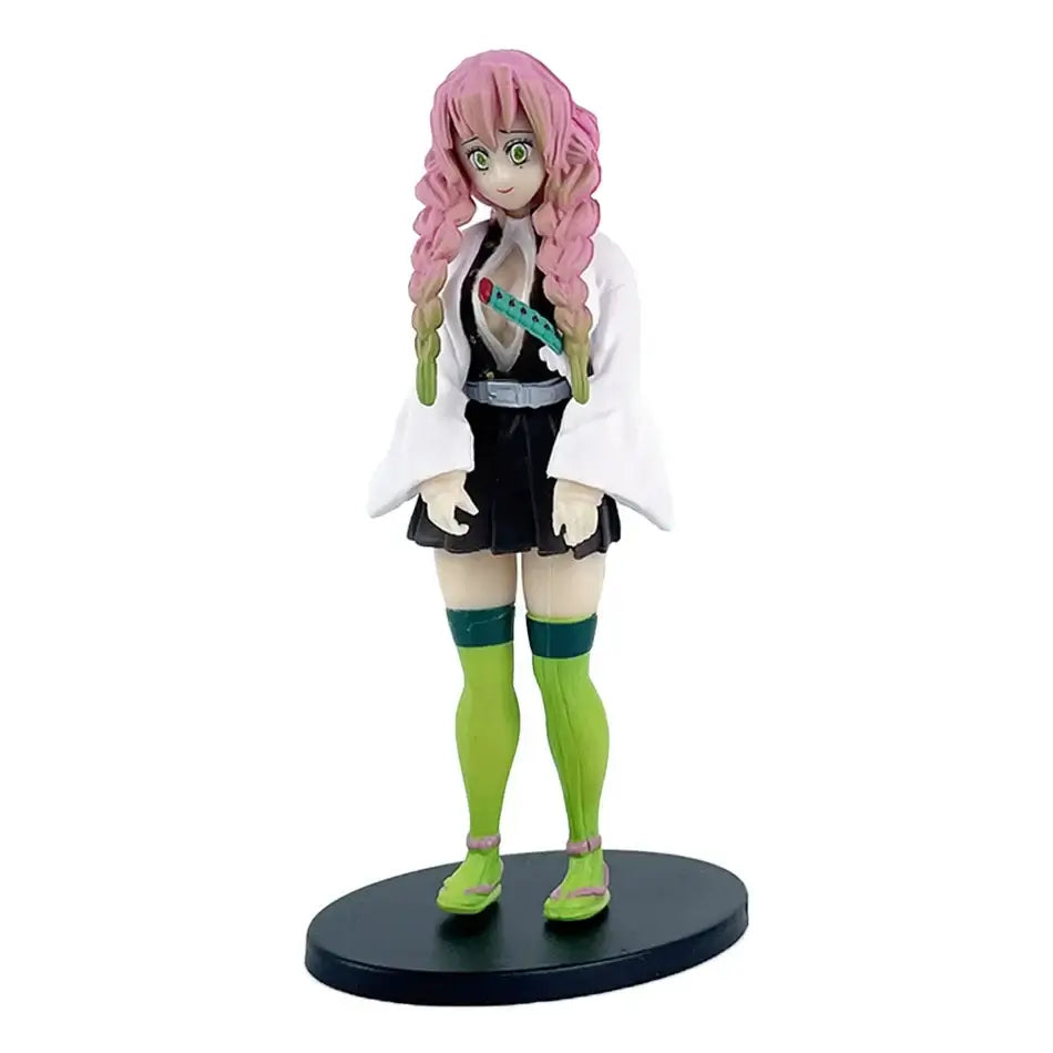 A highly detailed 16cm Demon Slayer Anime Figure made of premium PVC, showcasing Kamado Tanjiro in a dynamic warrior action pose for desktop decoration.