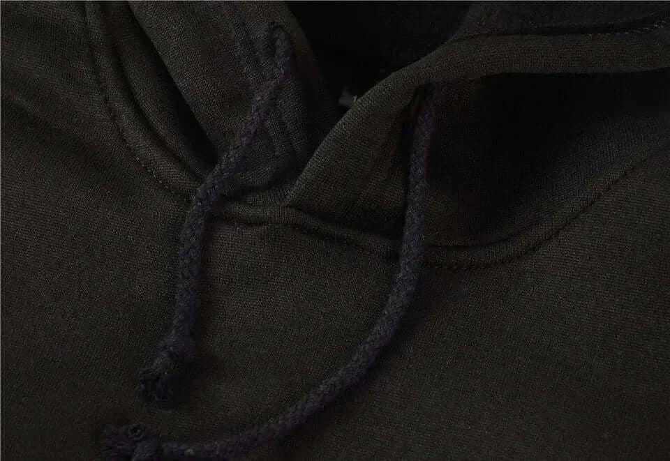 A trendy oversized Demon Slayer Hooded Sweatshirt featuring colorful anime character graphics, designed as casual autumn streetwear for men and women.