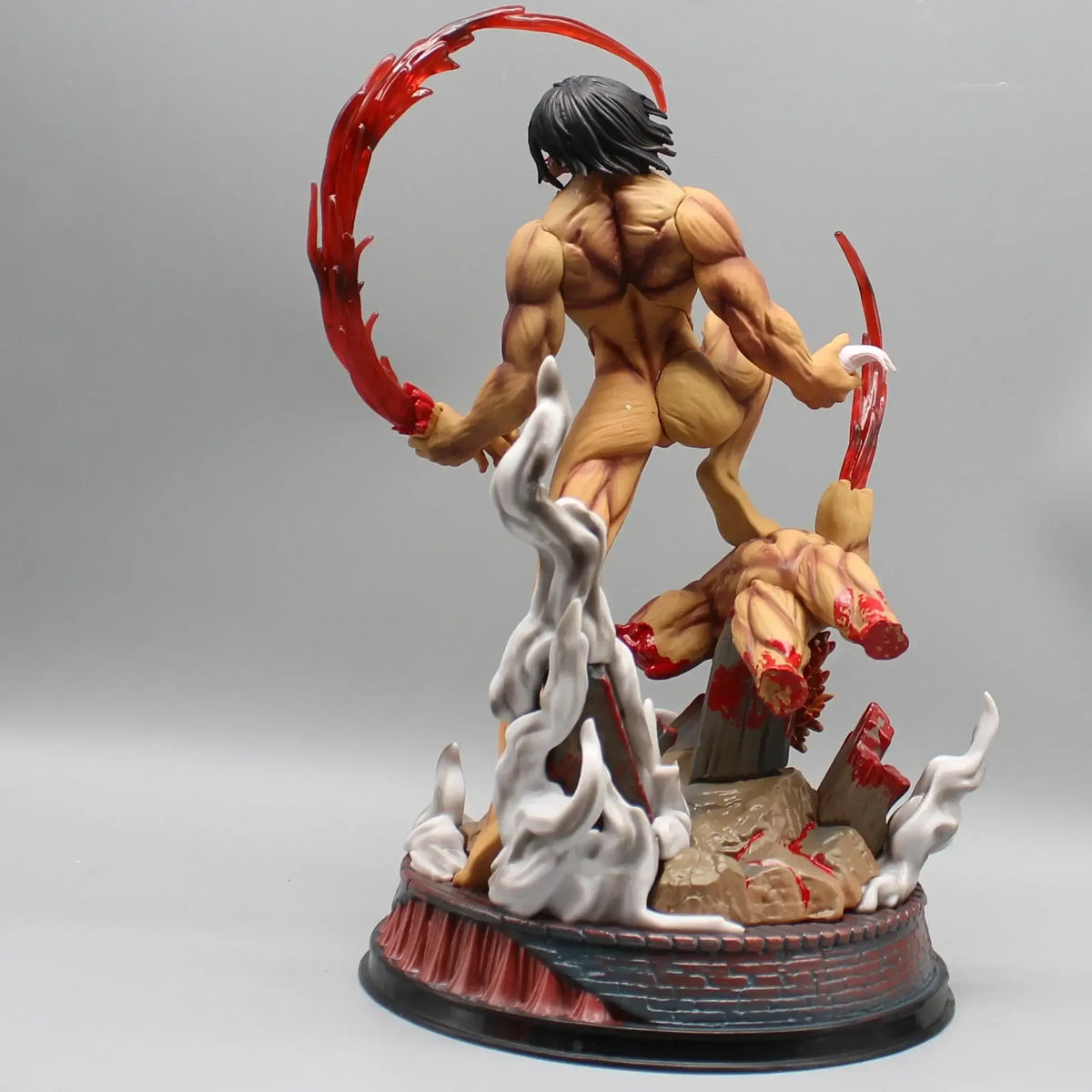 A highly detailed 29cm Eren Jaeger Figure made of premium PVC, showcasing the Attack on Titan protagonist in a dynamic pose for anime desktop decoration.