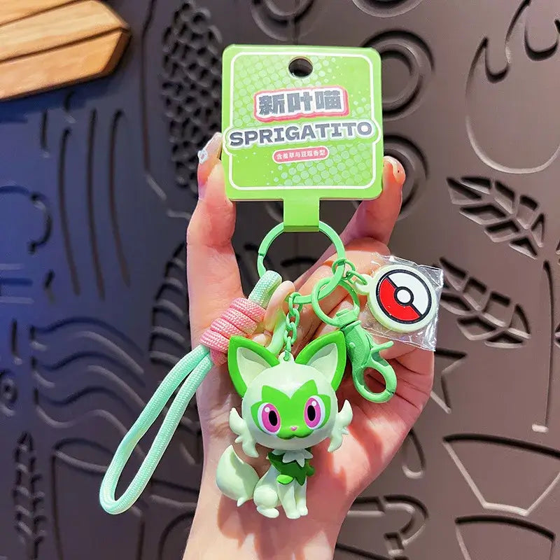 A Genuine Pokemon Keychain featuring a 3D Pikachu and Gengar anime action figure with a fragrance pendant design for backpacks.