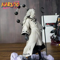 A highly detailed 28cm Uchiha Madara Figure made of premium PVC, showcasing the legendary Naruto anime character in a dynamic battle stance.