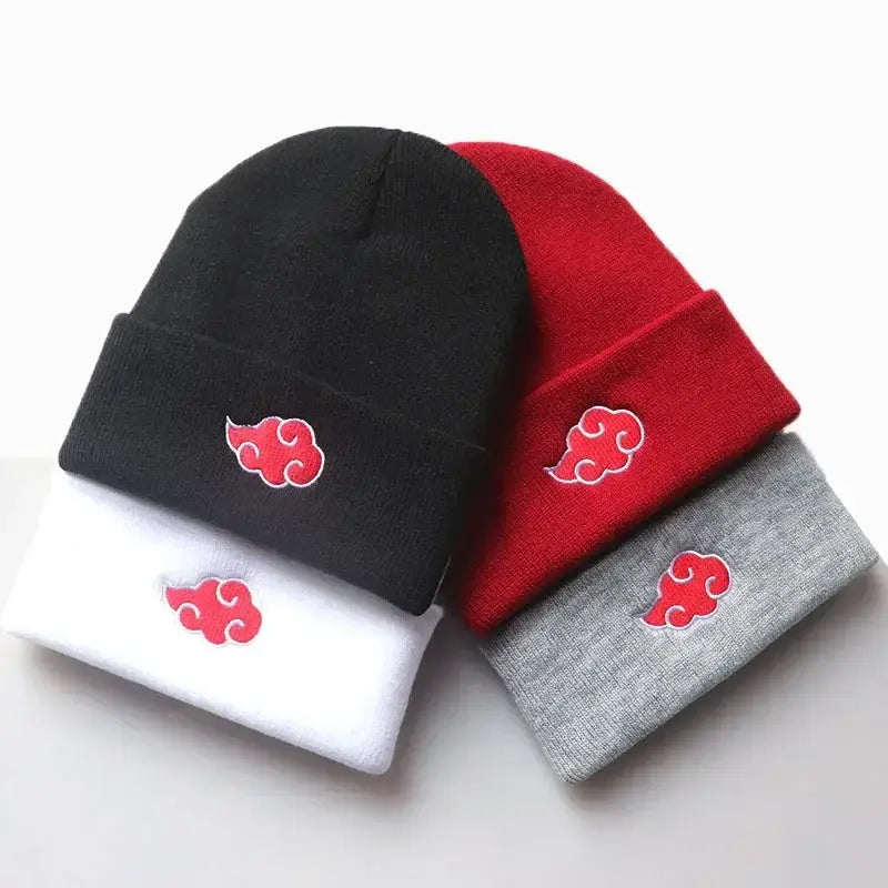 A black knitted Akatsuki Beanie featuring the red cloud embroidery symbol, designed as a warm unisex winter hat for men and women.