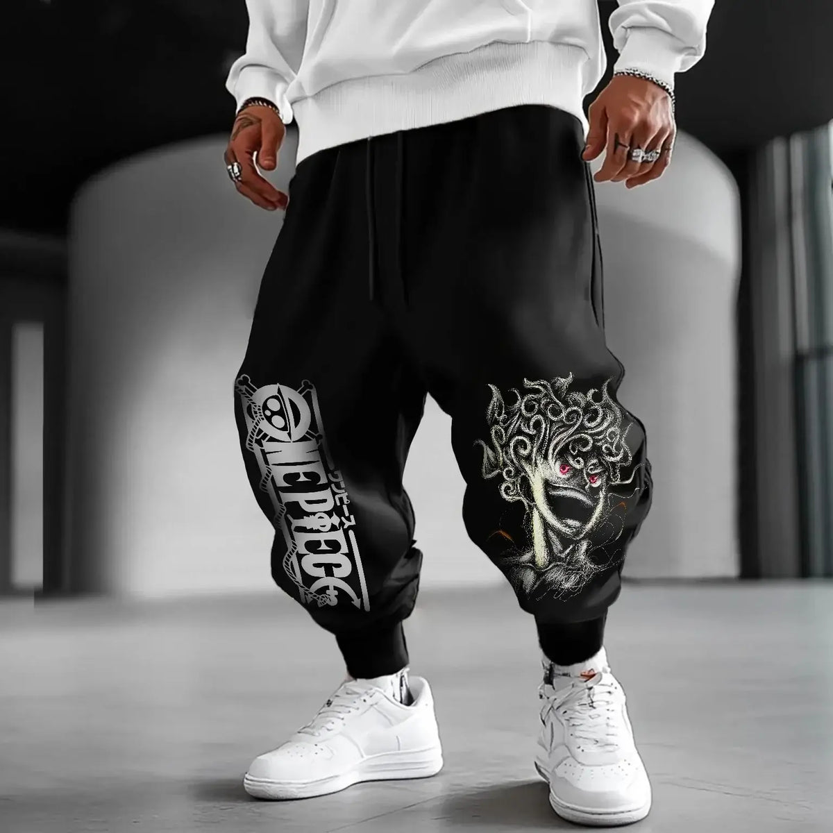 Trendy One Piece Graphic Joggers featuring anime character prints, designed as casual Y2K streetwear sweatpants for men and women.