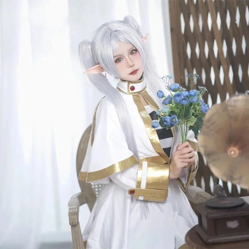 Frieren Cosplay Costume Set featuring dress, wig, elf ears, and earrings for anime enthusiasts.