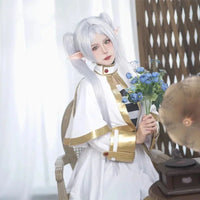 Frieren Cosplay Costume Set featuring dress, wig, elf ears, and earrings for anime enthusiasts.