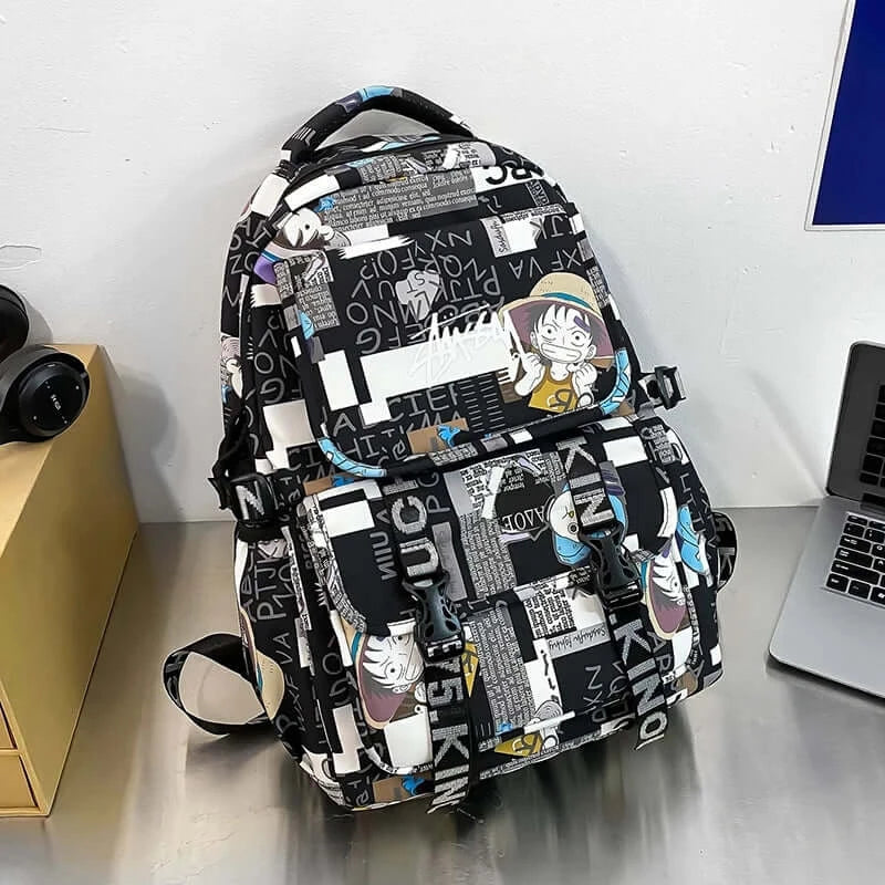 A high-capacity One Piece Luffy Backpack featuring a vibrant graffiti print of Monkey D. Luffy, designed as a durable school bag for middle and high students.