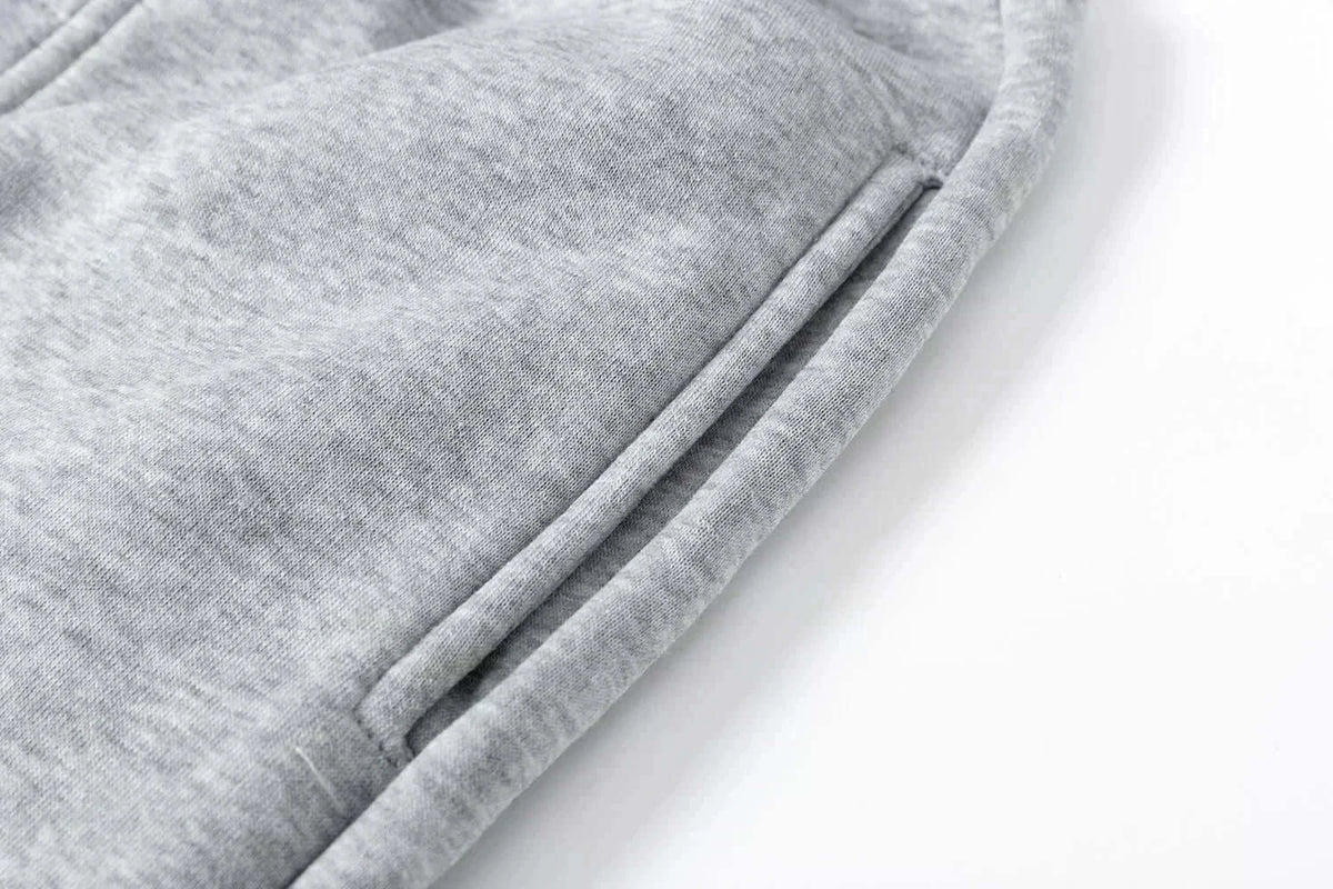 Trendy One Piece Graphic Joggers featuring anime character prints, designed as casual Y2K streetwear sweatpants for men and women.