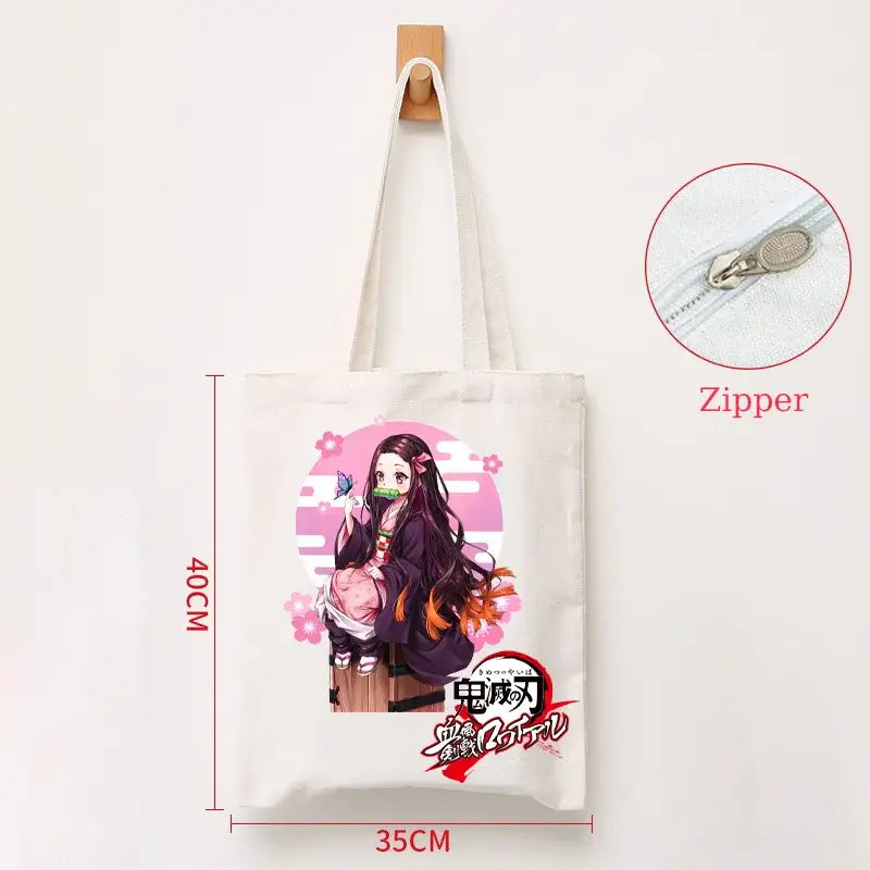 A durable Demon Slayer Canvas Bag featuring Kamado Nezuko and Tanjiro anime graphics, designed as a zipper tote for students and shoppers.