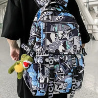 A high-capacity One Piece Luffy Backpack featuring a vibrant graffiti print of Monkey D. Luffy, designed as a durable school bag for middle and high students.