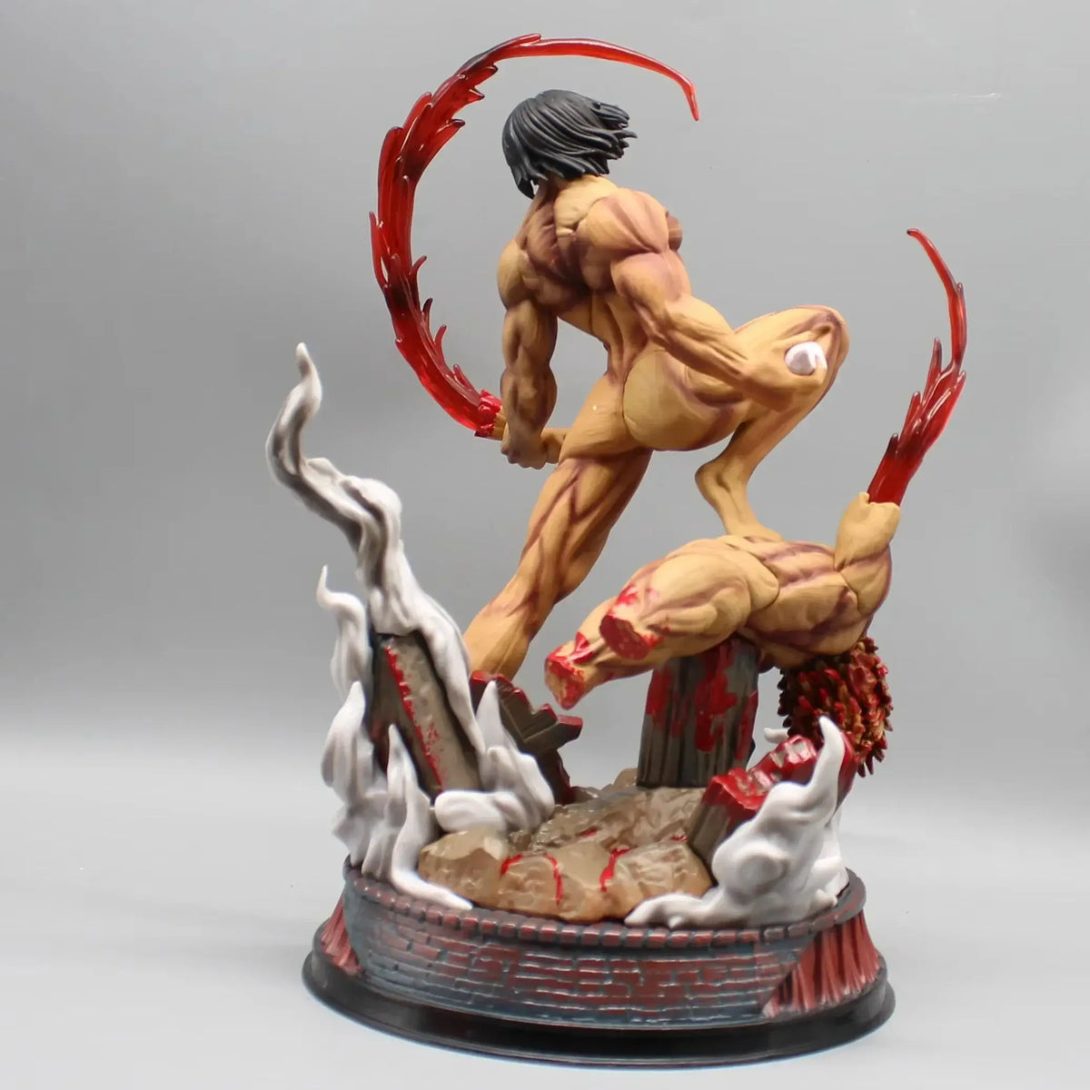 A highly detailed 29cm Eren Jaeger Figure made of premium PVC, showcasing the Attack on Titan protagonist in a dynamic pose for anime desktop decoration.