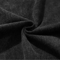 Close-up of Asta Black Clover Vintage Washed Oversized T-Shirt black fabric texture, showcasing soft cotton material.
