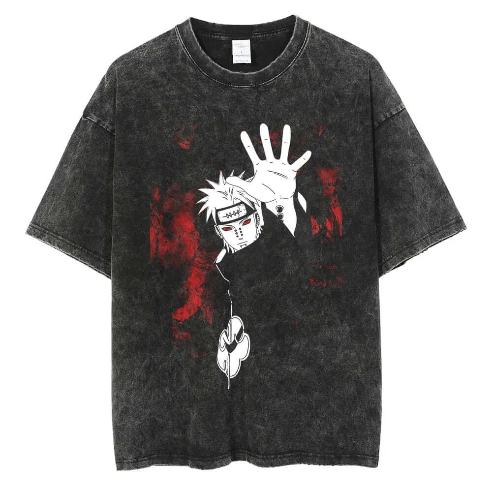 A man wearing the vintage black Japanese Anime Naruto Print T Shirt in a Harajuku hip hop streetwear style.