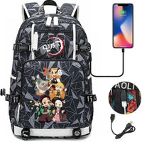 A pink and black Nezuko Demon Slayer Backpack featuring a USB charging port and kawaii anime character art, designed for teen girls and students.