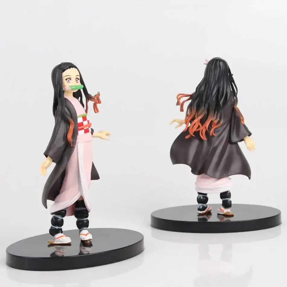 A highly detailed 16cm Demon Slayer Anime Figure made of premium PVC, showcasing Kamado Tanjiro in a dynamic warrior action pose for desktop decoration.