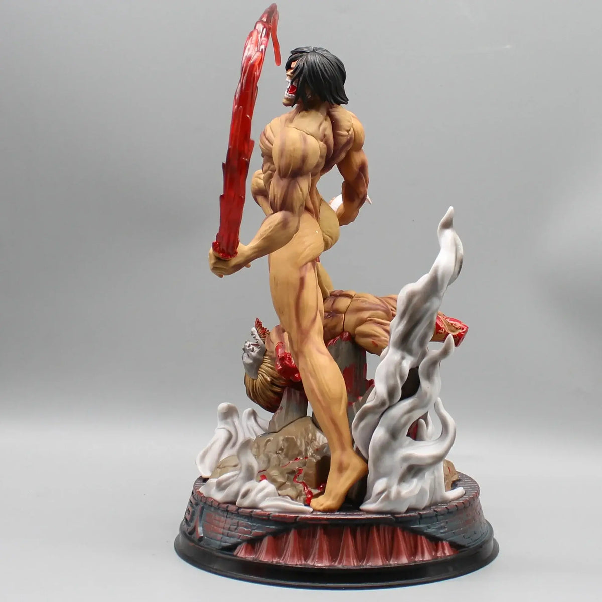 A highly detailed 29cm Eren Jaeger Figure made of premium PVC, showcasing the Attack on Titan protagonist in a dynamic pose for anime desktop decoration.