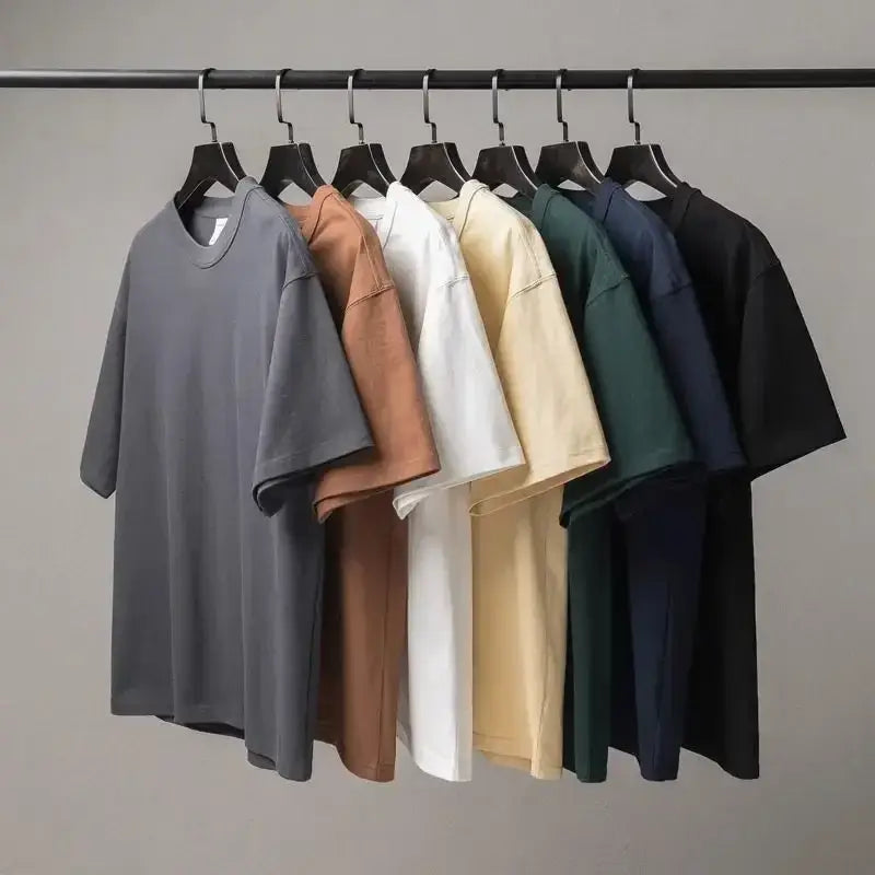 Kokushibo Demon Slayer Breathable Anime T-Shirt displayed in various colors hanging on a rack.