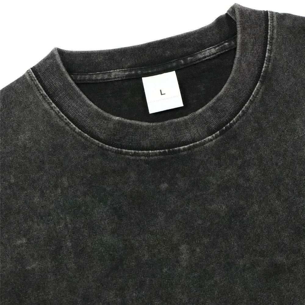 BLEACH Y2K Oversized T-Shirt featuring unique graphic design and washed black fabric, ideal for Harajuku streetwear fans.