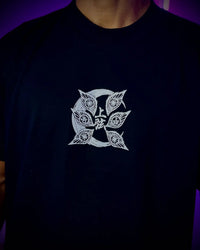 A couple wearing matching oversized Demon Slayer Graphic T Shirts in a hip hop, Y2K streetwear style.